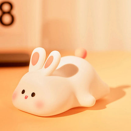 Big face rabbit patting small night light colorful toy ornaments